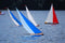 RC Sailboat Racing: A group of Model Sailboats at a Remote Control Boat Race