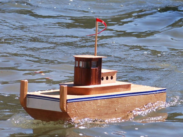 RC Tugboat: Remote Control Boat Speeding through the water