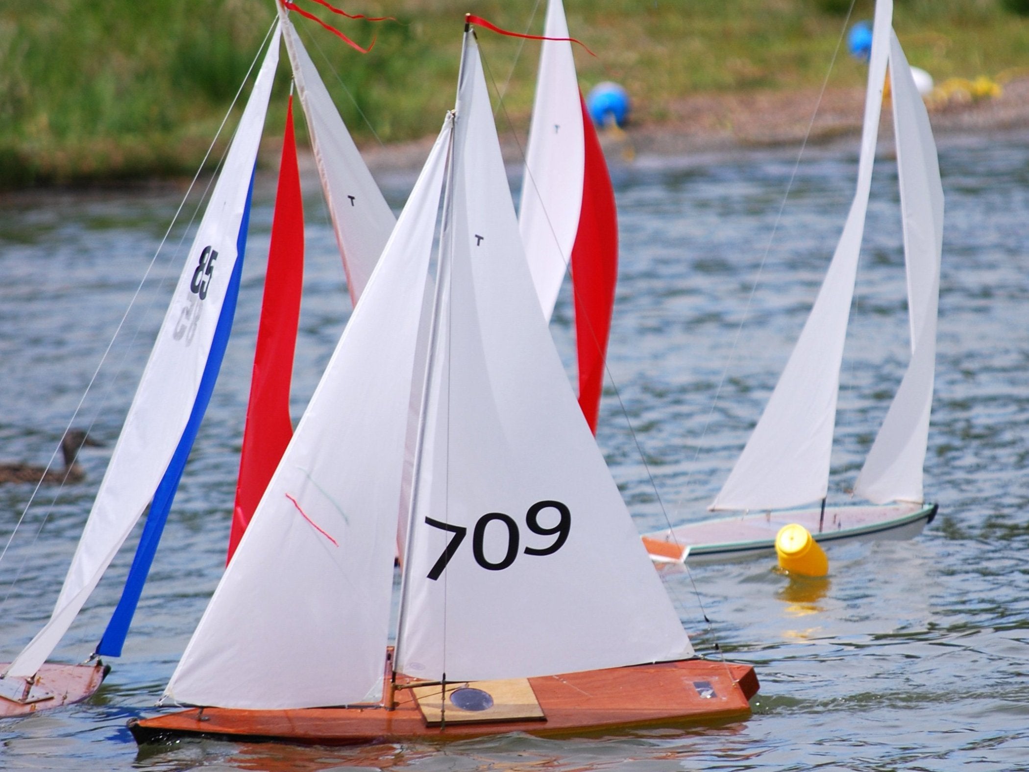 RC Sailboat Racing: Remote Control Sailboats with Racing Upgrades at a Model Sailboat Race