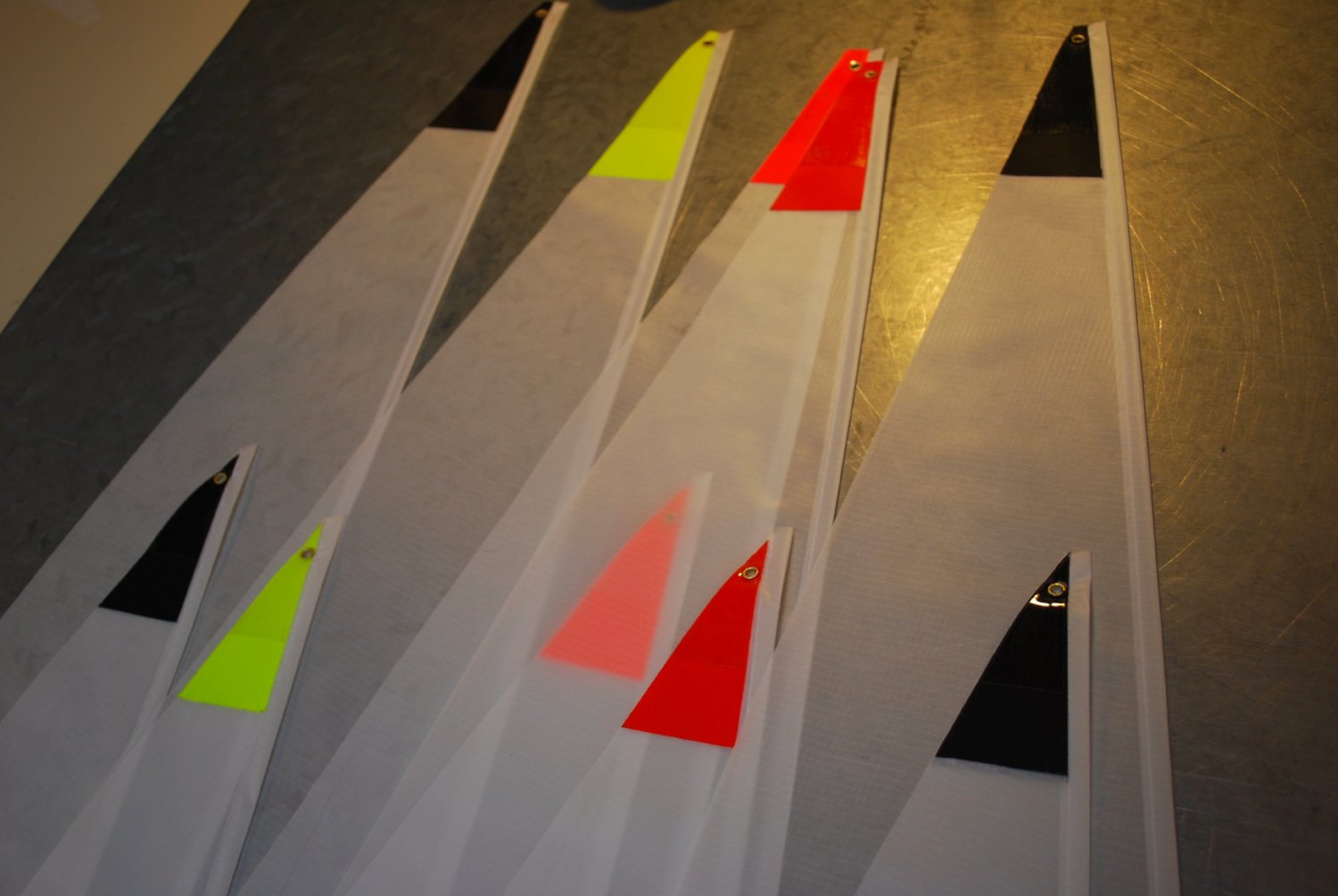 Kyosho SeaWind Sails by Tippecanoe Boats - Close up of top colored corners